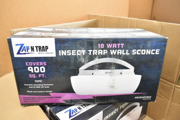 4 brand new Zap N Trap 605WS18W insect wall sconces in box. Covers 900 sq. ft., 18W, includes hardware and UV bulb.