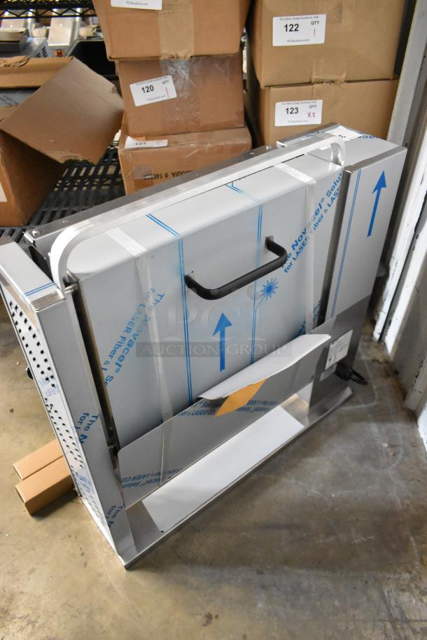 Brand new Prince Castle 296-T55JACK stainless steel vertical contact toaster. Countertop model, 115V, in original packaging.
