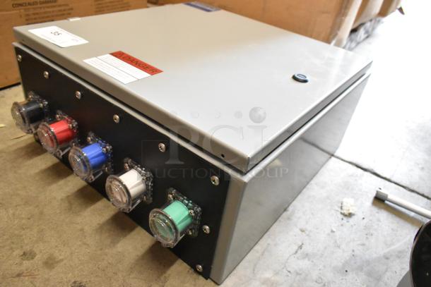 Power Assemblies gray metal box with multiple colored connectors, safety warning label, and secured lid, in excellent condition.