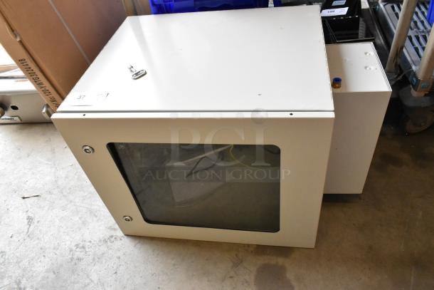 BRAND NEW! BlackShields DC0300 white metal cabinet, pristine condition, with glass front panel and secure lock.