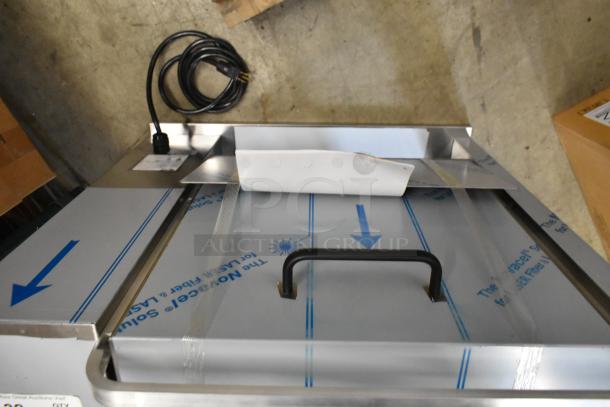 Brand new Prince Castle 296-T55JACK stainless steel vertical contact toaster, 115V, shown in packaging with power cord.