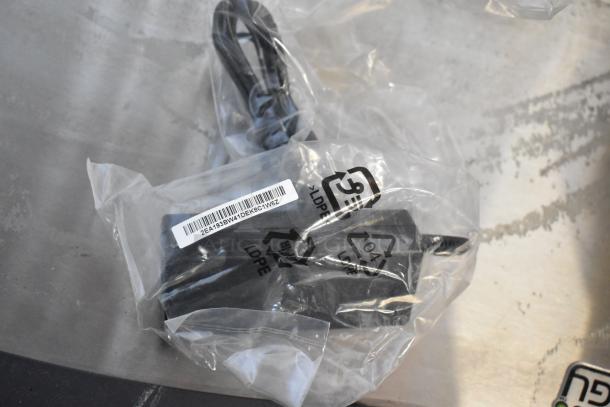 Brand new EloTouch ESY22I1-2UWB-0-AO-GY-G display cables in sealed packaging with barcode label visible.
