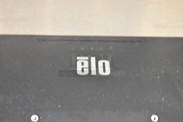 Brand new EloTouch ESY22I1-2UWB-0-AO-GY-G display in box, showcasing Elo logo. Mint condition, unopened packaging.