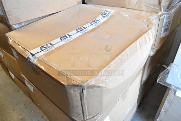 Two unopened Power Assemblies gray metal boxes in original packaging. Boxes show shipping labels and secure tape.