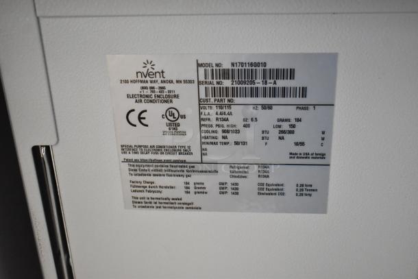 Brand new Hoffmann N170116G010 Spectracool Compact air conditioner with 1025 BTU, 110/115 Volts, 1 Phase, visible label details.