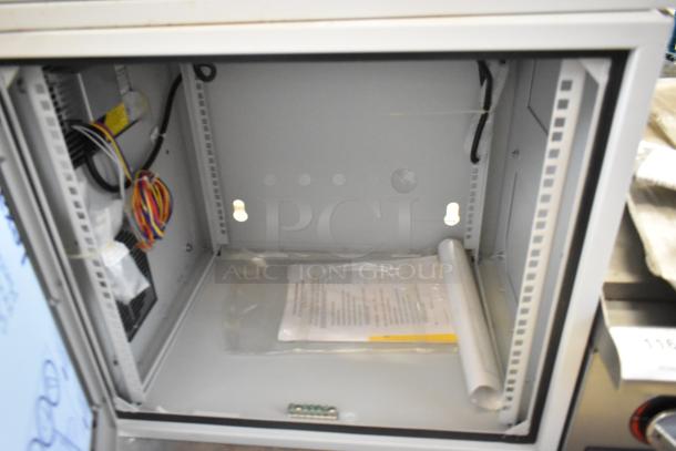 2 Hoffmann N170116G010 Spectracool Compacts in new condition, 1025 BTU, 110/115V. Includes Martin Box, visible wiring, and packaging.