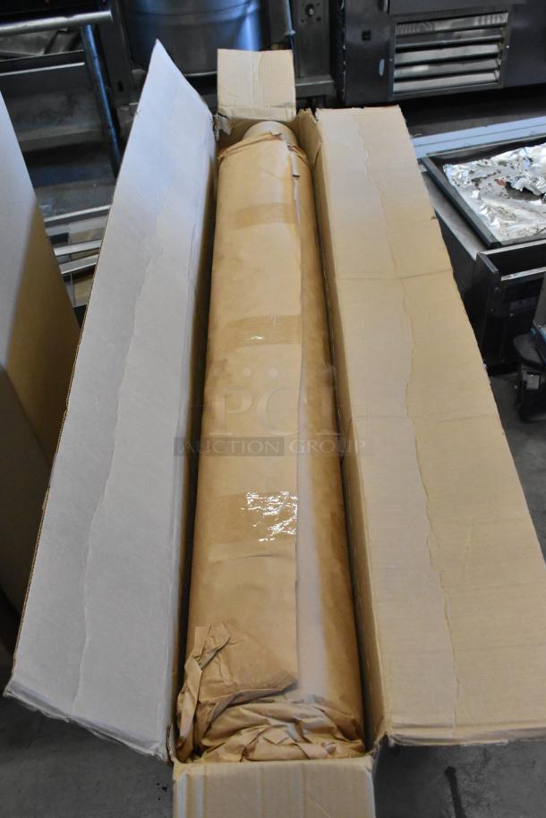 Brand new MIN-012-EK01 unit in original box, wrapped in protective brown paper, showcasing unopened condition.