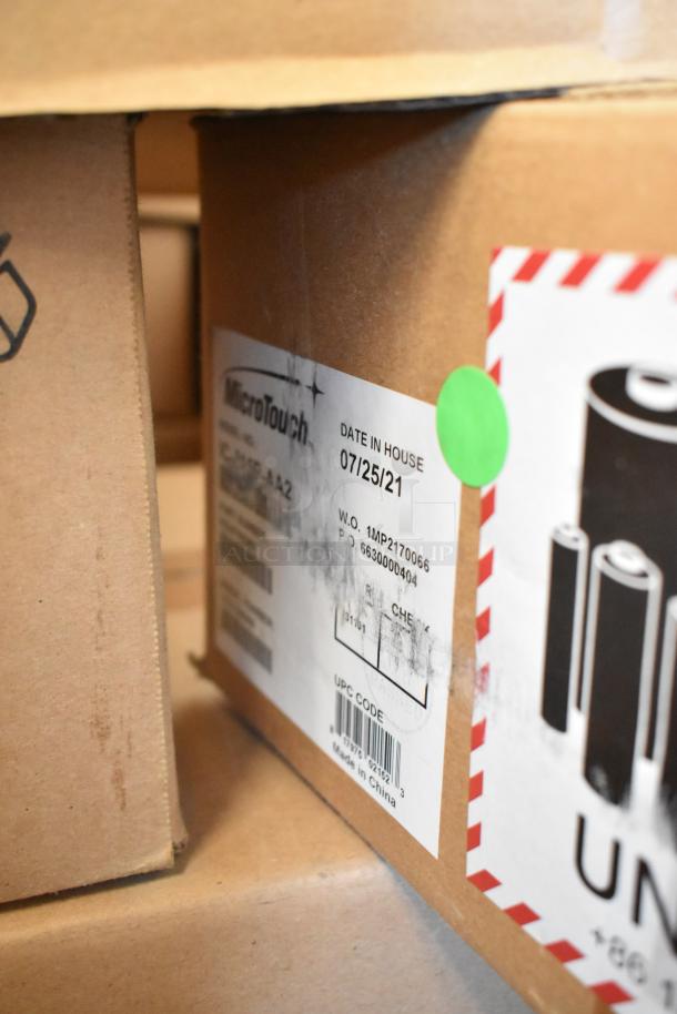 Two new MicroTouch IC-215P-AA2 monitors in unopened boxes, labeled with date 07/25/21, made in China.