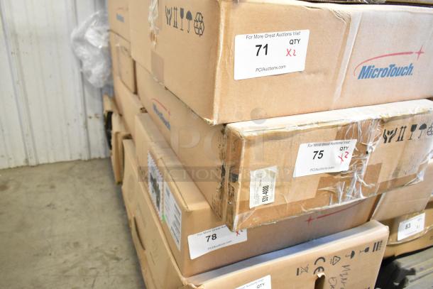 New in box MicroTouch IC-215P-AA2 monitors, quantity 2. Boxes with auction labels showing lot numbers 71 and 75.