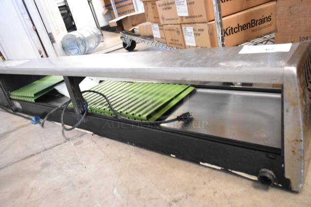 Hoshizaki HNC-180BA-R-S stainless steel sushi display case, 115V, showing countertop design with green trays.