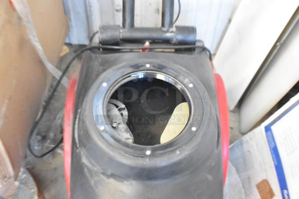Viper FANG15B floor cleaning machine, used condition, visible tank opening, black and red exterior, for industrial cleaning.