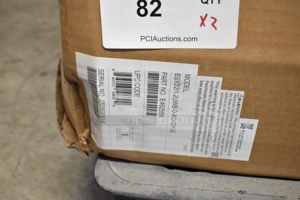 Brand new EloTouch ESY22I1-2UWB-0-AO-GY-G display in box. Label shows model, serial no. J20390916, and part no. E462589.