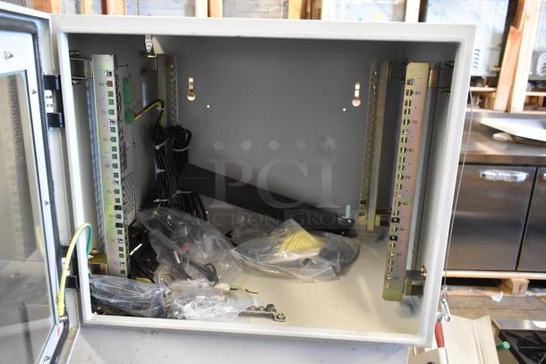 "Brand new BlackShields DC0300 white metal cabinet, open door showing interior components, wiring, and mounting hardware."
