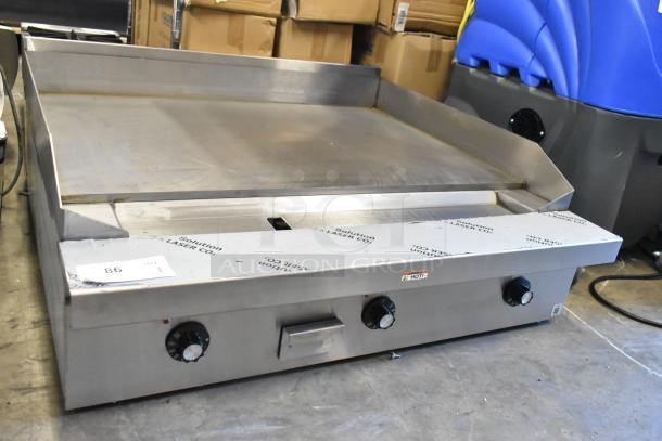 2021 Southbend PE36N-TTT stainless steel electric griddle, brand new, 208 volts, 1 phase, with intact protective film.