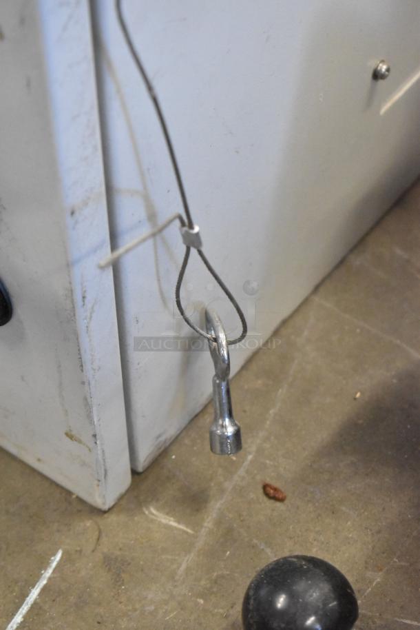 Brand new BlackShields DC0300 white metal cabinet, one locked with key, slight surface marks, one missing key.