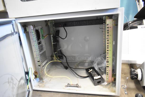 BlackShields DC0300 white metal cabinet, new condition with power strip, internal wiring, and one missing key.