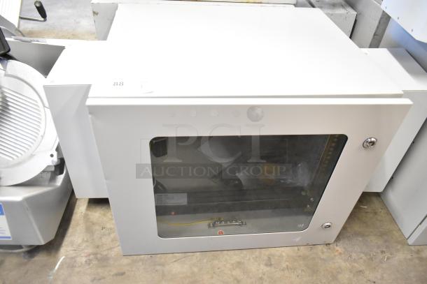 Brand new BlackShields DC0300 white metal cabinet, no key, transparent window, secure latches, durable construction.