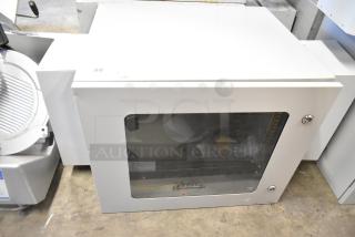 Brand new BlackShields DC0300 white metal cabinet, no key, transparent window, secure latches, durable construction.
