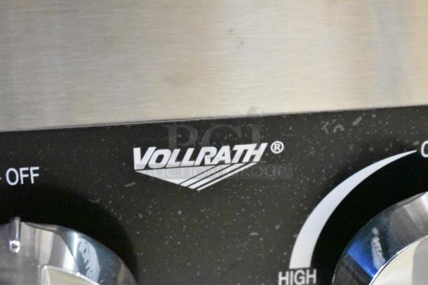 BRAND NEW Vollrath HPA-1002 stainless steel 2 burner range. Features 26,000 BTU. Visible brand logo.