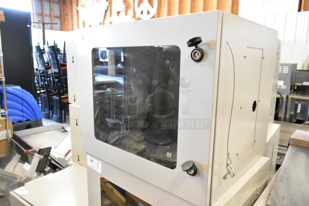 BRAND NEW BlackShields DC0300 white metal cabinet with clear front panel. Secure locks visible.