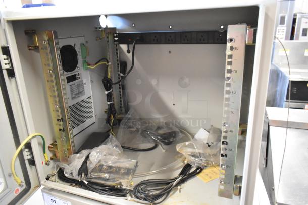 Brand new BlackShields DC0300 white metal cabinet, with internal shelving, wiring, and power management, in pristine condition.