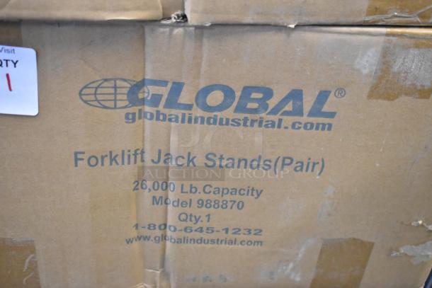 Box displays "Global 988870 Forklift Jack Stands, Pair, 26,000 lb Capacity, Brand New" with contact details.