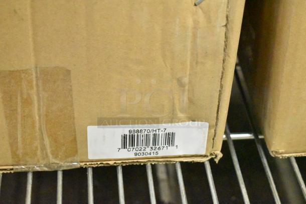 Brown box labeled "988870/HT-7" with barcode, containing 2 new Global 988870 forklift jack stands, 26,000-pound capacity.