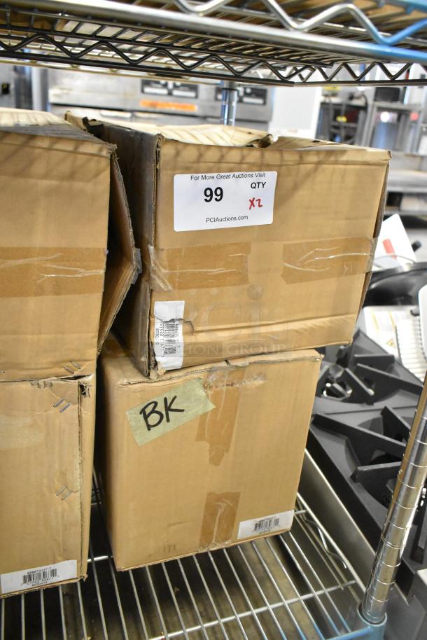 Brand new Global 988870 forklift jack stands, 26,000 lb capacity, in original packaging. Labels indicate auction quantity.