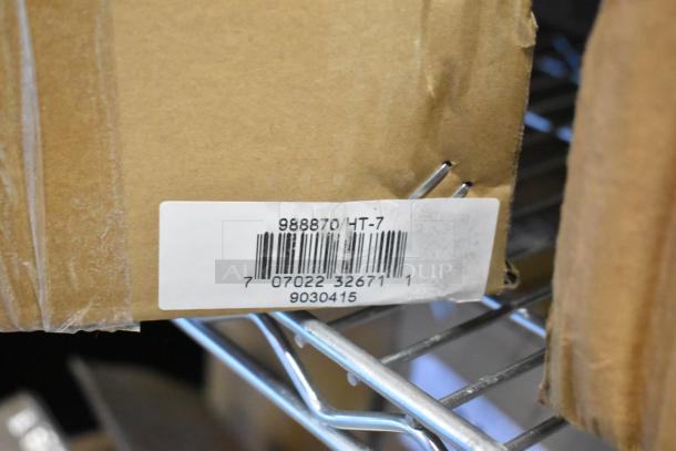 Pair of new Global 988870 forklift jack stands, 26,000 lb capacity, in original packaging with model label visible.