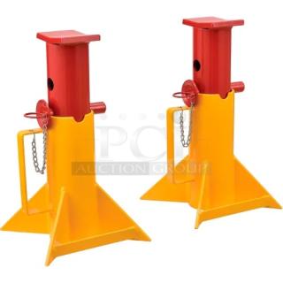 Pair of Global 988870 forklift jack stands, 26,000 lb capacity, brand new, red and yellow, robust construction, includes safety pins.
