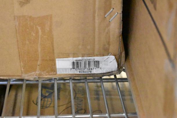 New Global 988870 26,000 lb capacity forklift jack stand in box. Barcode visible: 70722326711. Box shows minor wear.