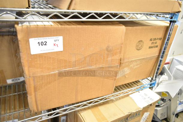 Two boxes of Advance Tabco 7-PS-56 stainless steel sinks, new, unopened. Labels indicate quantity X2.