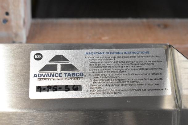 Brand new Advance Tabco 7-PS-56 stainless steel wall mount sink. Features cleaning instructions label with NSF certification.
