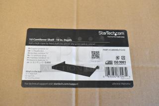 Four brand new StarTech 1U Cantilever Shelves in box, 10" depth. Includes four shelves, cage nuts, and mounting screws.