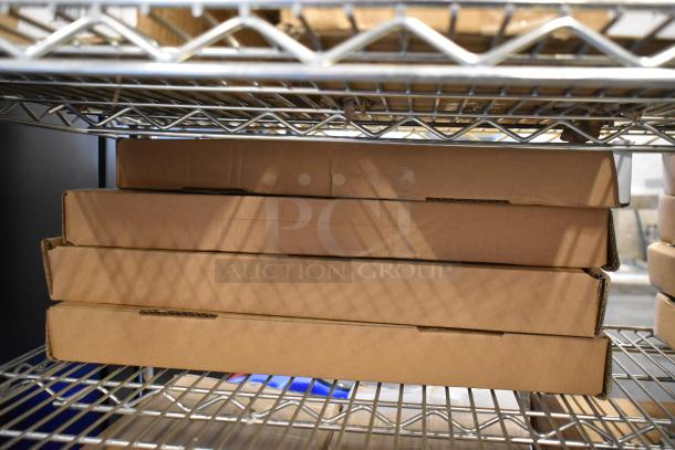 Four brand new StarTech 1U Cantilever Shelves in unopened boxes on a metal rack.