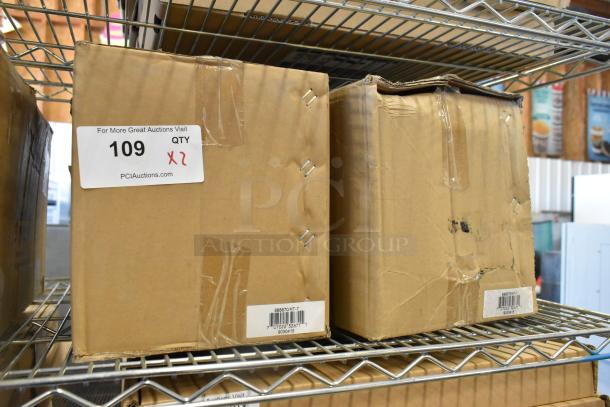 Two unopened boxes of Global 988870 26,000 lb capacity forklift jack stands on a shelf. Label shows quantity x2.
