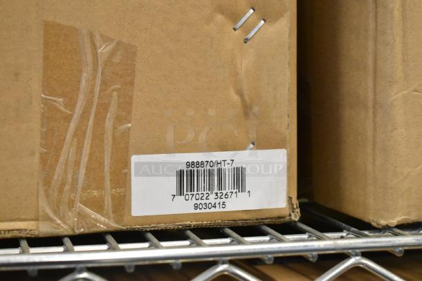 Box containing brand new Global 988870 forklift jack stand, 26,000 lb capacity. Barcode and model number visible on label.