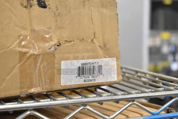 Cardboard box with label "988870/HT-7," containing two brand new Global 988870 forklift jack stands, 26,000 lb capacity.
