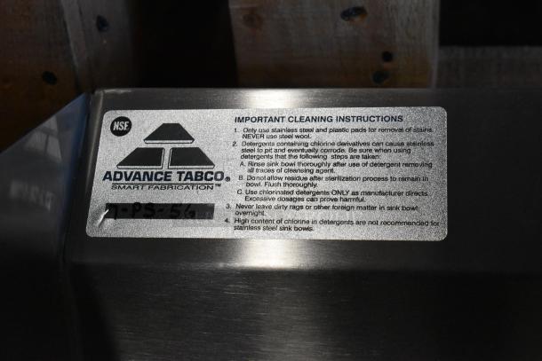 Advance Tabco 7-PS-56 stainless steel single bay wall mount sink, new in box with cleaning instruction label.
