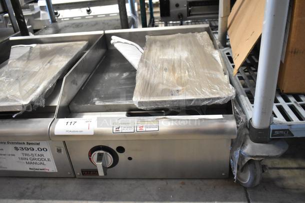 Brand new 2022 Tri Star TSGGM-18i stainless steel commercial countertop natural gas flat top griddle.