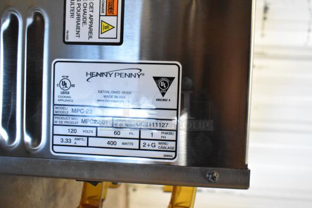 Brand new Henny Penny MPC-22 stainless steel holding bin, 120V, 1 phase, UL listed, model and serial number labels shown.