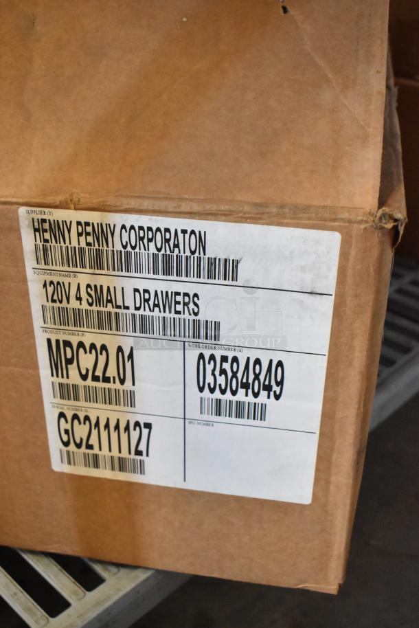 Brand new Henny Penny MPC-22 stainless steel holding bin in original packaging. Model MPC22.01, 120V, 1 Phase.