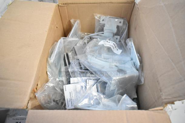 Brand new in box lot with pipe mounting kit and outlet box cover, sealed in plastic. Perfect condition, ready for installation.