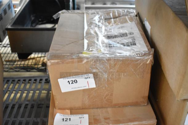 Brand new boxed lot with pipe mounting kit, outlet box cover. Cardboard box with shipping labels and auction tag marked "120 QTY."