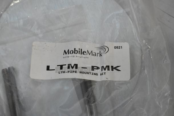 Brand new MobileMark LTM-PMK pipe mounting kit in sealed packaging, includes screws and outlet box cover, model 0521.