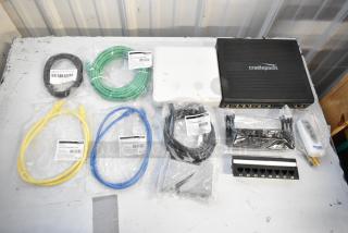 Brand new lot with Cradlepoint AER2200, Ruckus Access Point, wiring, Ethernet cables. Items in original packaging.