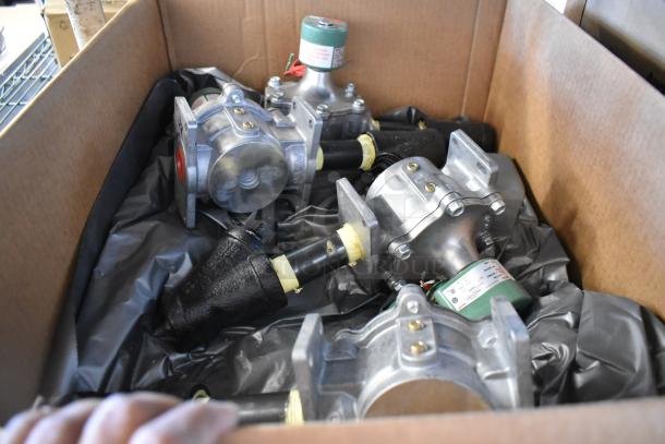 Box containing 4 brand new Asco 323632 rebuild kits, featuring industrial components, in mint condition with labels.