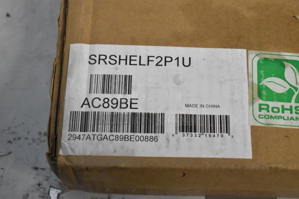 Brand new Tripp Lite SRSHELF2P1U cantilever fixed shelf in box, model AC89BE, RoHS compliant, made in China.