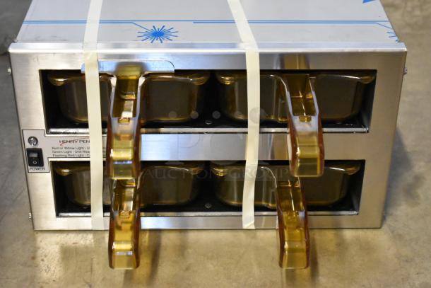 Brand new Henny Penny MPC-22 stainless steel countertop holding bin, 120V, 1-phase, in original box, with visible power switch.