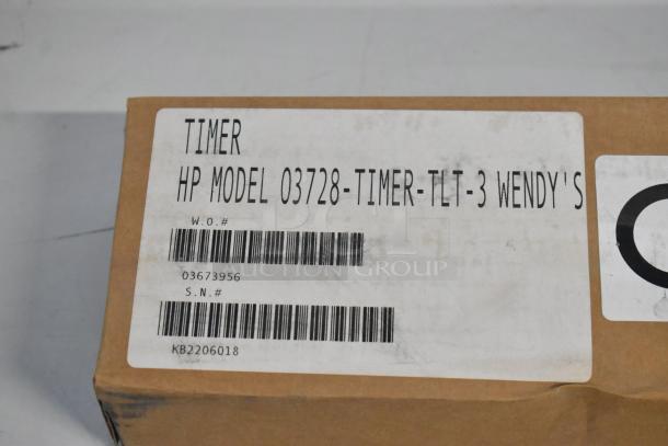 Brand new HP 03728-TIMER-TLT-3 Three Lane Timer in box with label indicating model and serial numbers.
